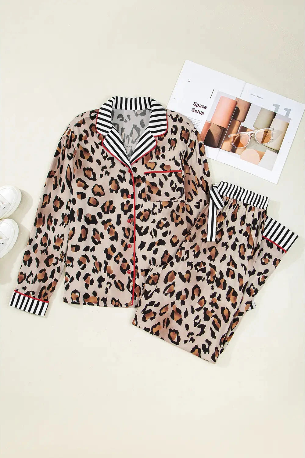Leopard print pajama set with striped shirt on a light background