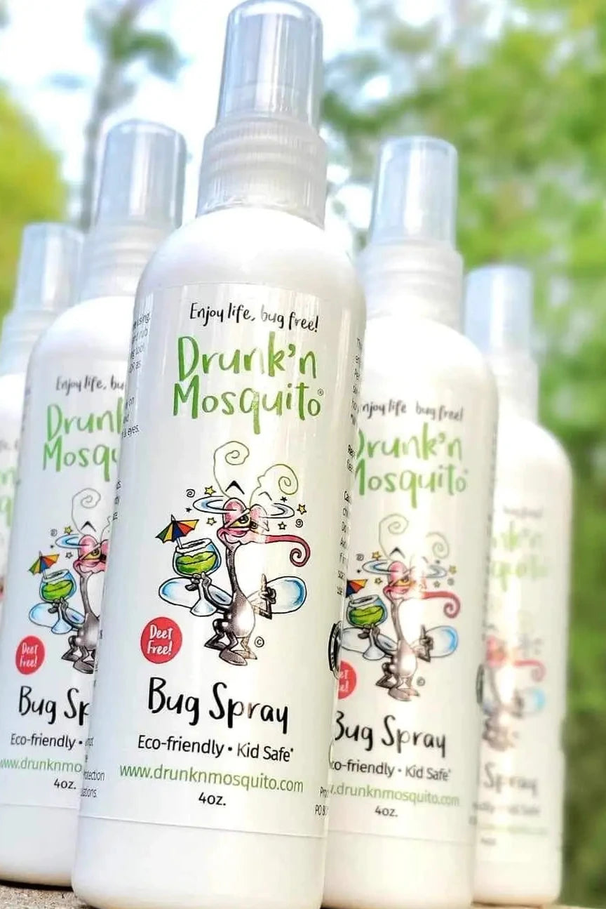 Drunk'n Mosquito bug spray bottles with a natural background