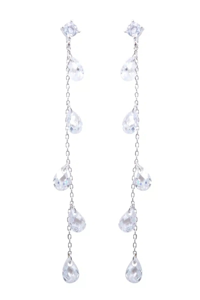 Pair of silver teardrop earrings on a white background