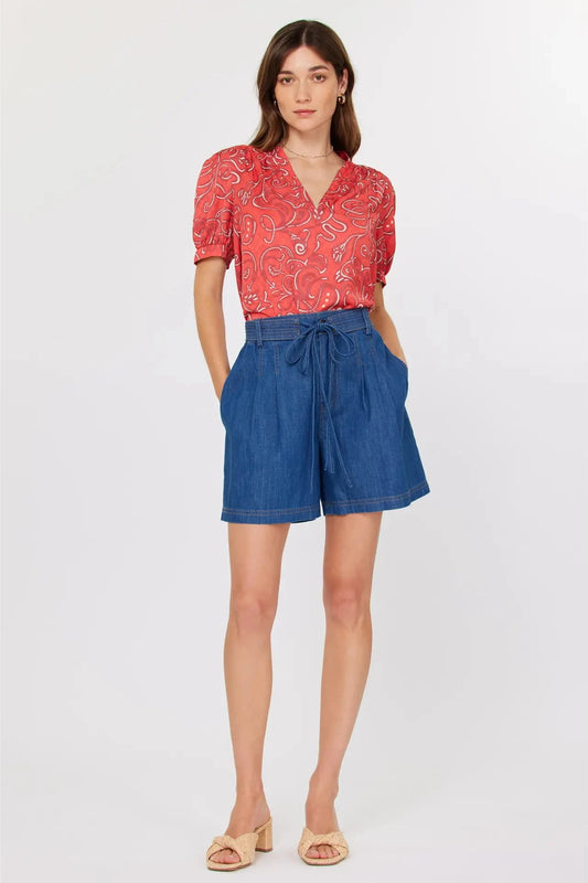 jean shorts with tie on a white background