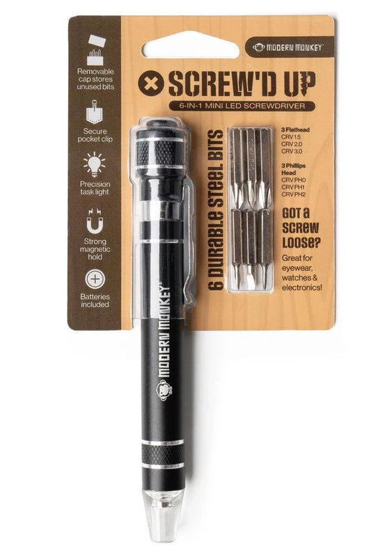 Screwdriver with LED light and multiple bits on a wooden packaging