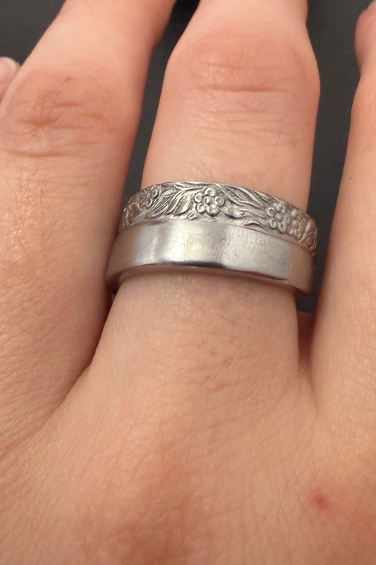floral ring shown on hand