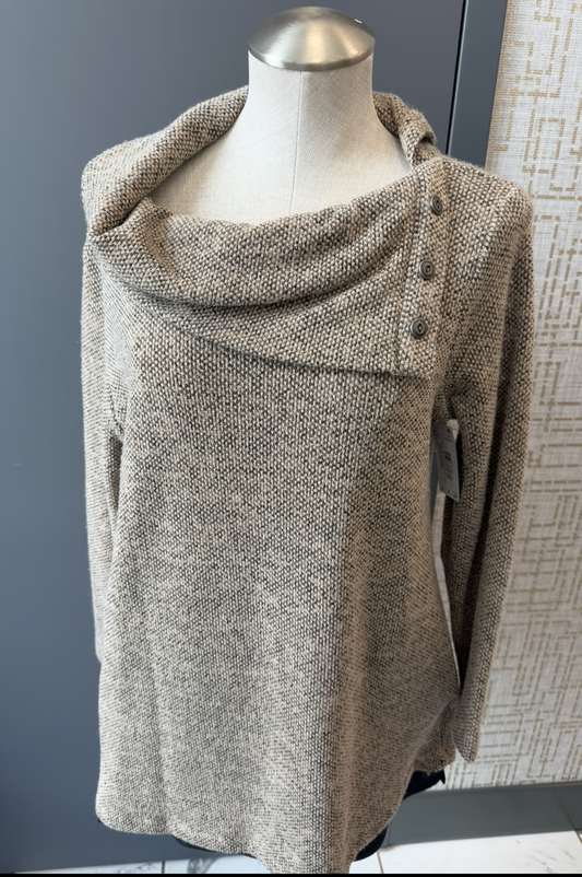 Mannequin wearing a gray textured sweater against a neutral background