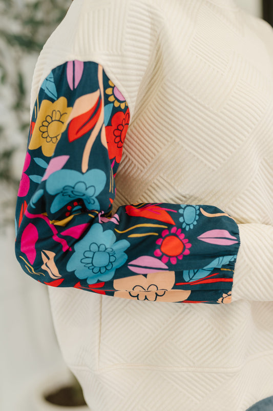 Floral-patterned product on a textured white surface