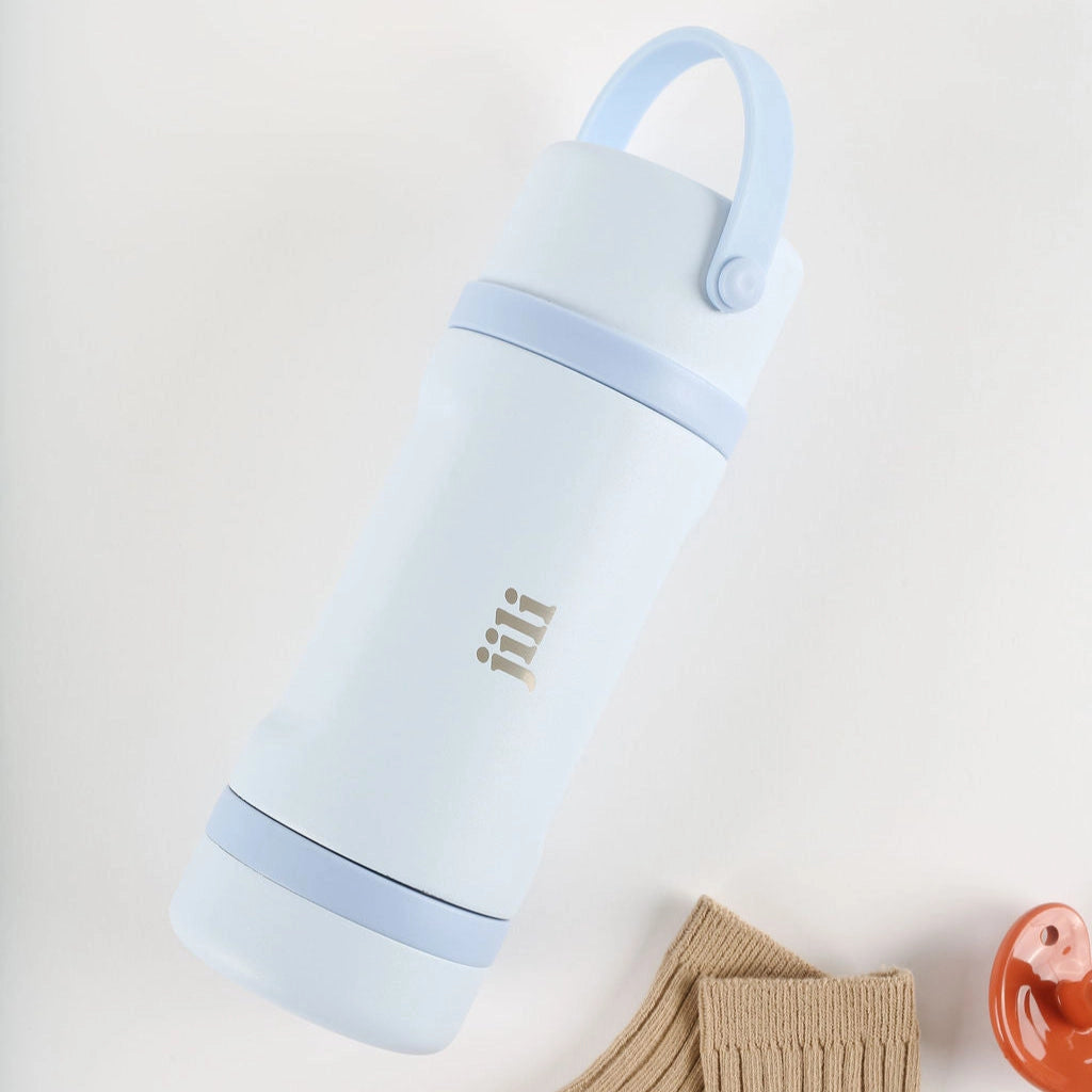Light blue insulated bottle with a handle on a white background