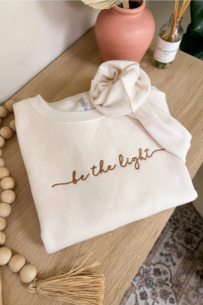 Embroidered Be The Light Crewneck