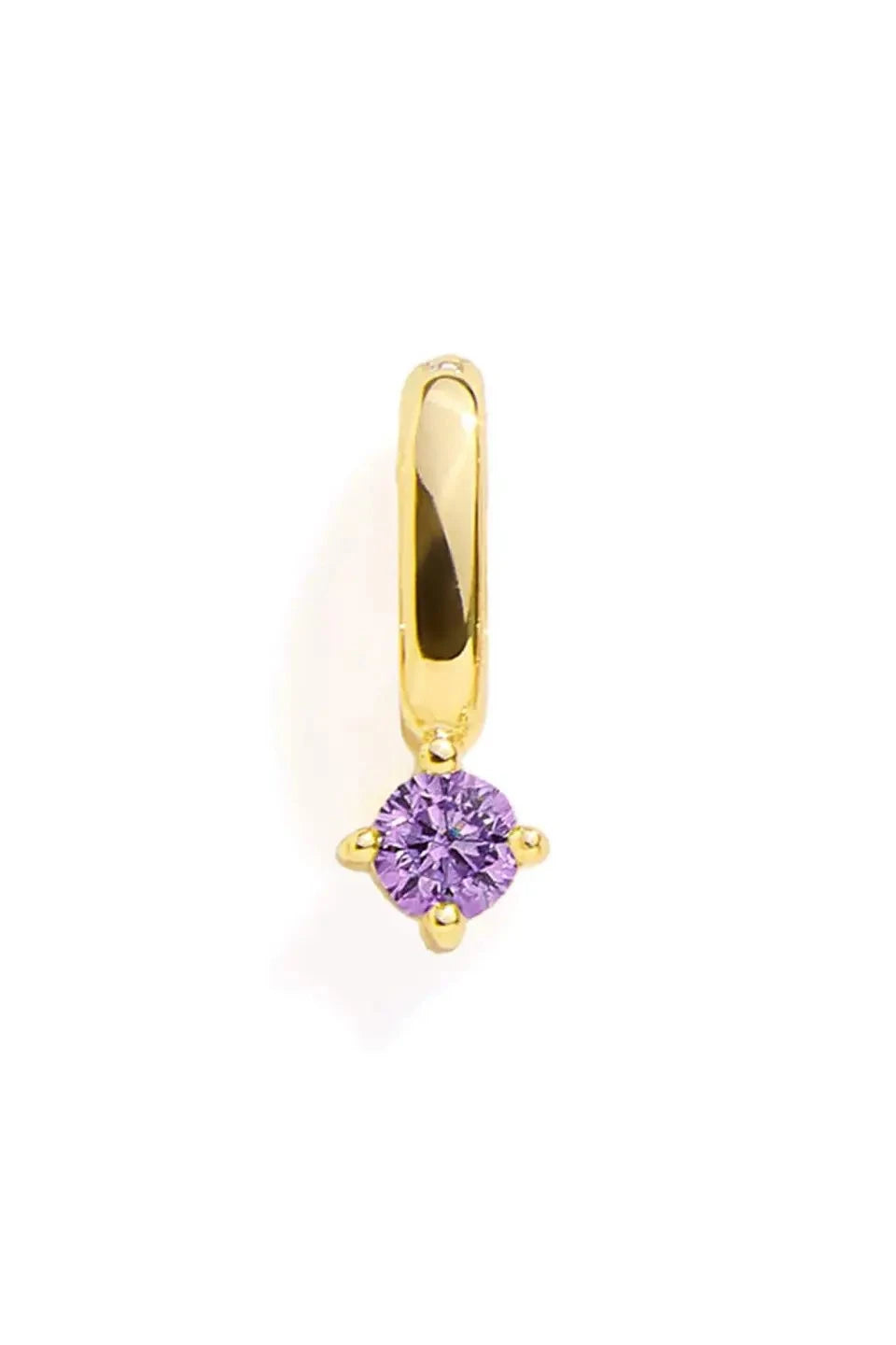 Gold earring with a purple gemstone on a white background