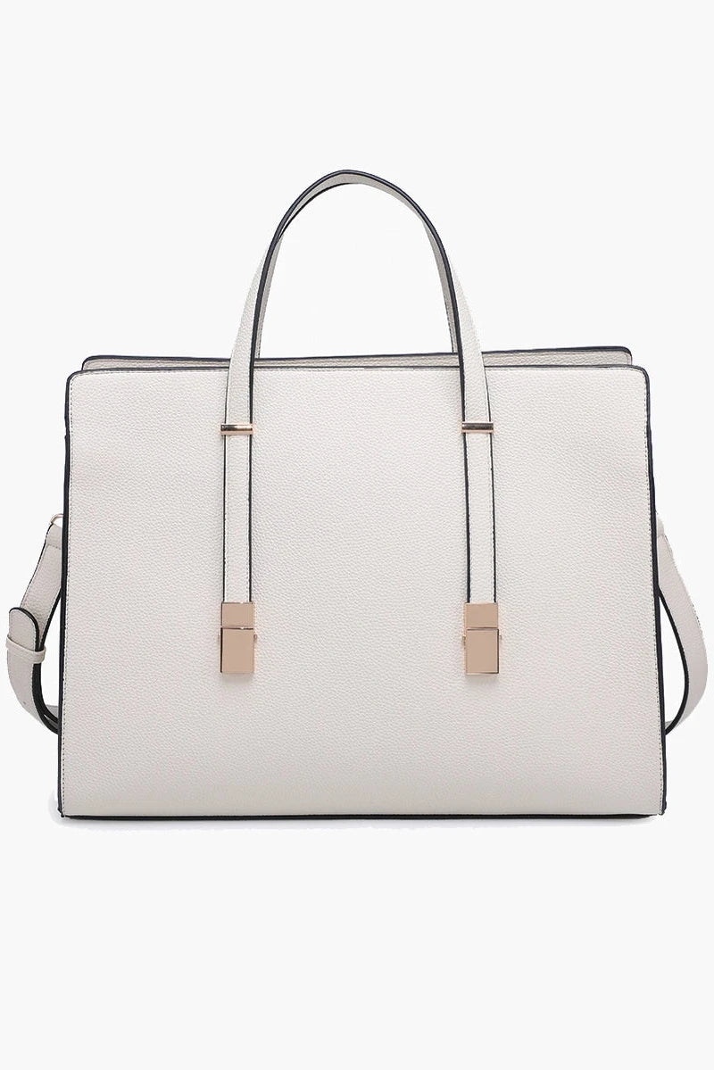 White handbag with gold accents on a white background