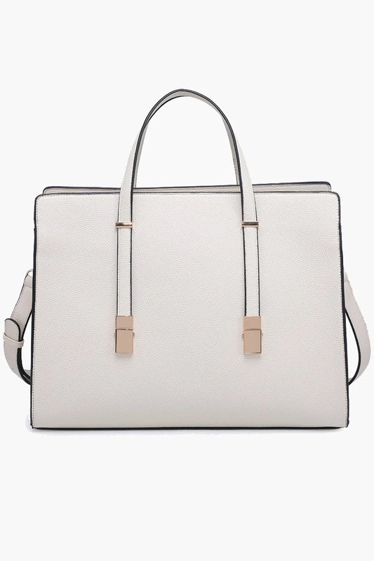 White handbag with gold accents on a white background