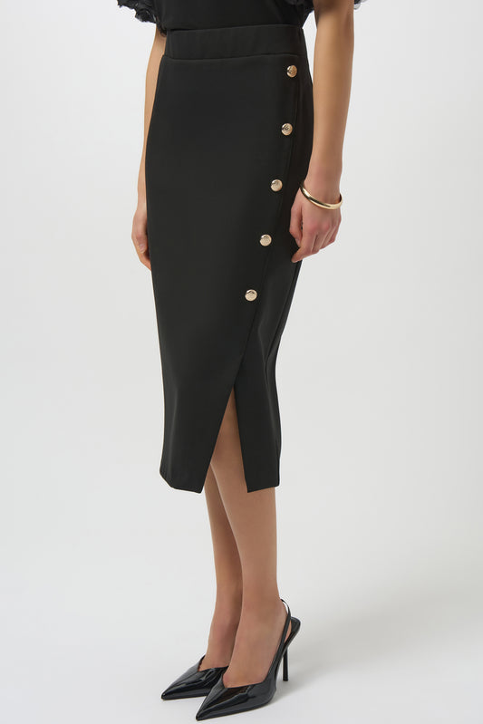 Black buttoned skirt worn by a person on a white background