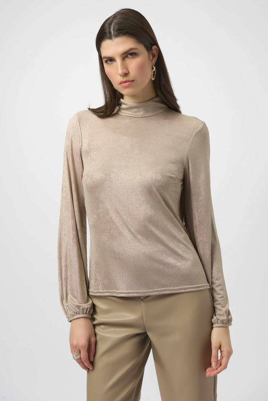 Foiled knit mock neck fitted top on model. 