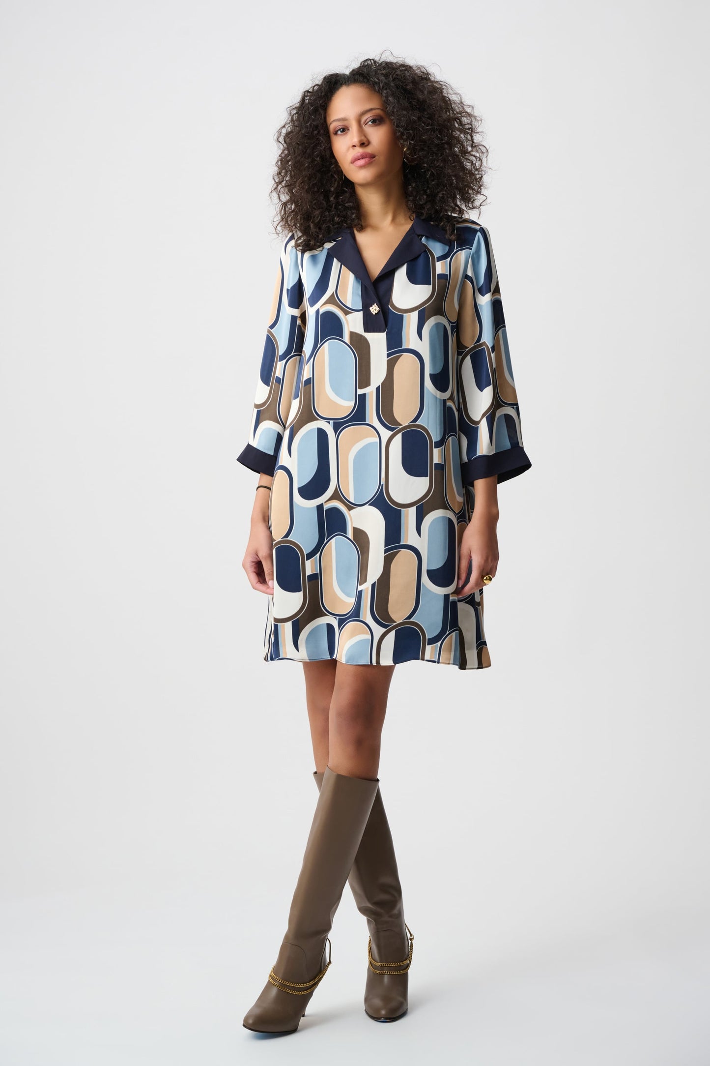geometric dress with navy, blue, tan, white, and brown