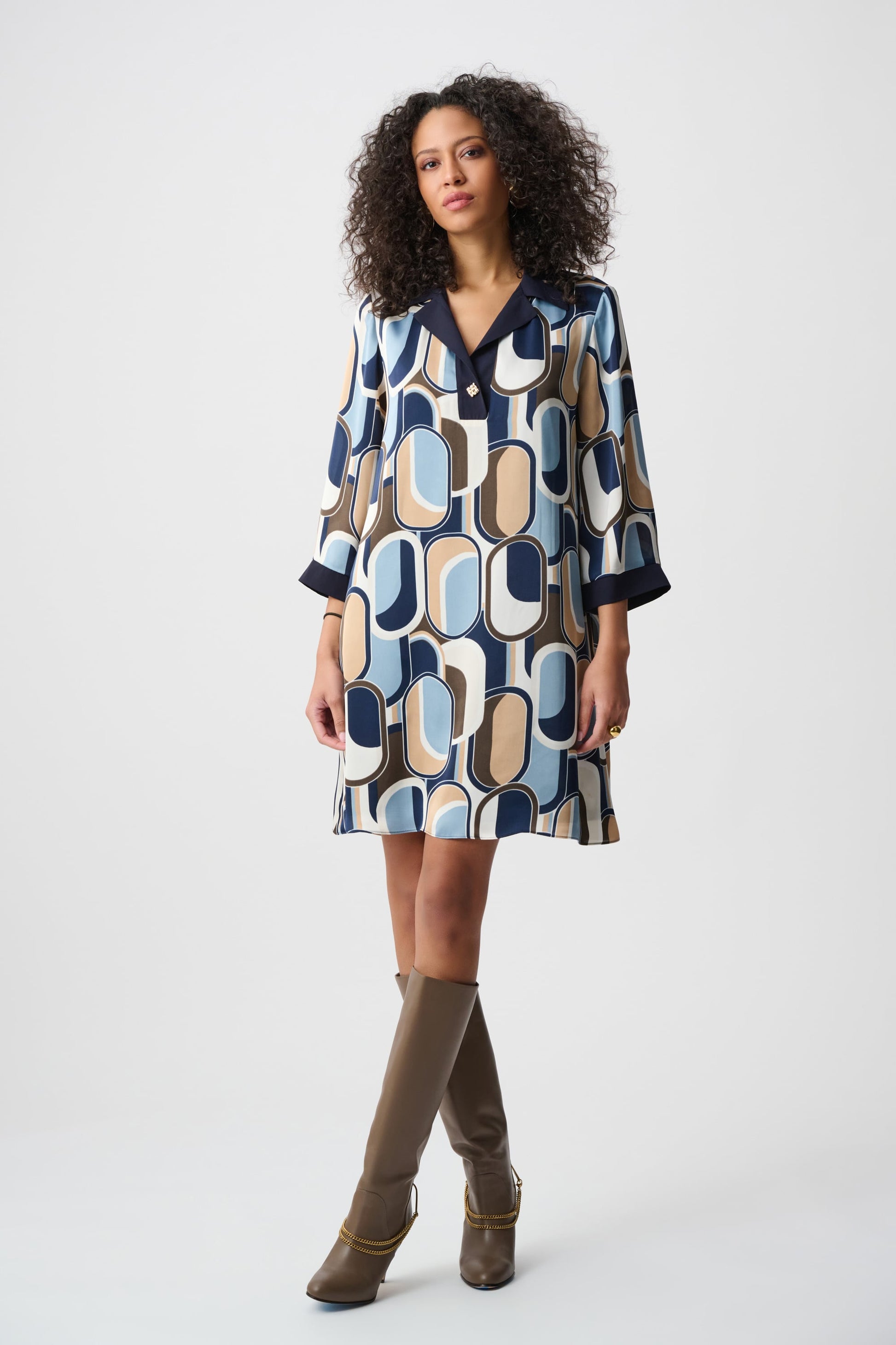 geometric dress with navy, blue, tan, white, and brown