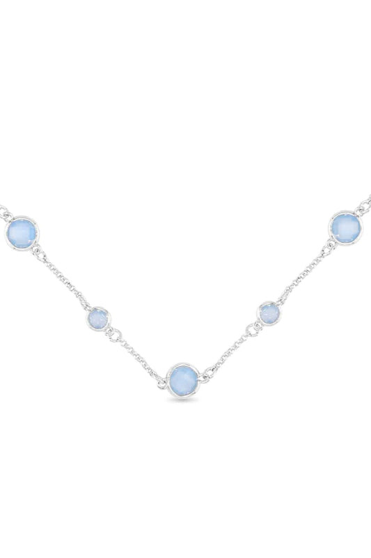 Necklace with light blue gemstones on a white background
