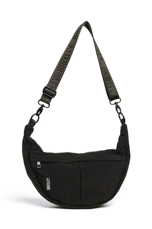 Black dog sling bag with a visible brand logo on a white background