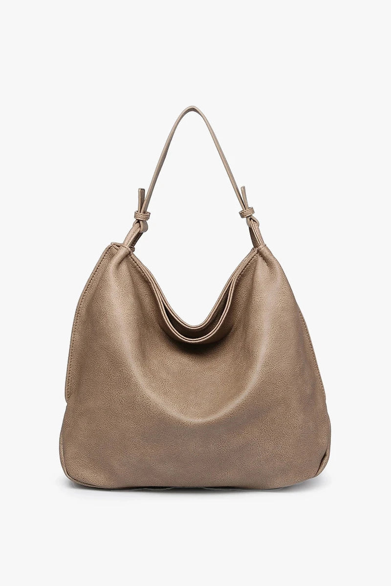 Beige handbag on a white background