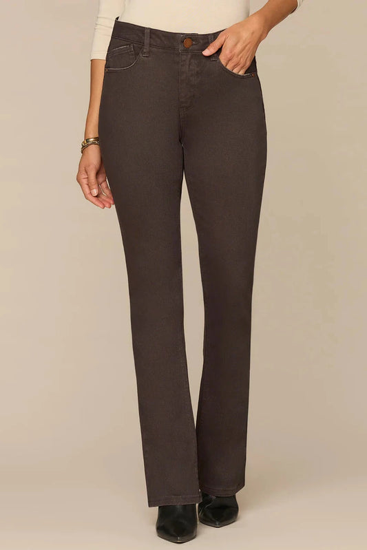 Person wearing pants on a beige background