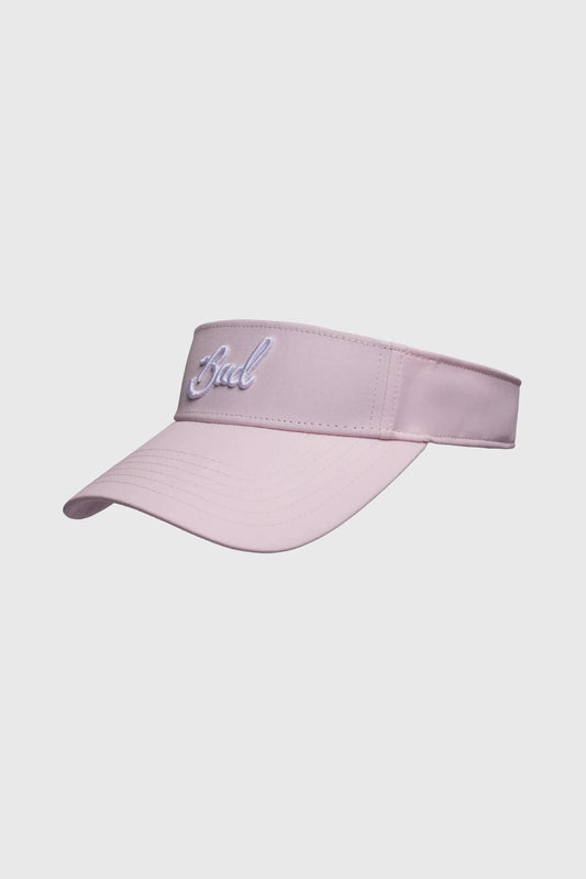 Pink visor with 'Bad' embroidery on a light gray background