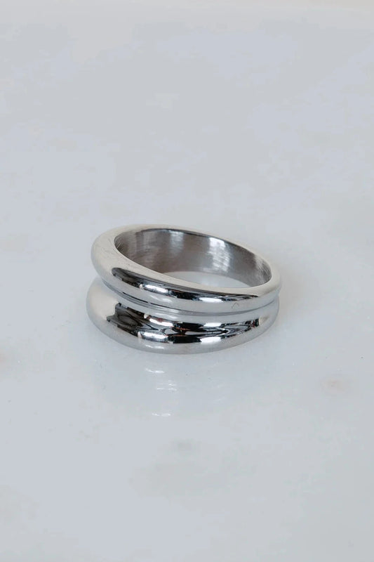 Silver ring on a white background