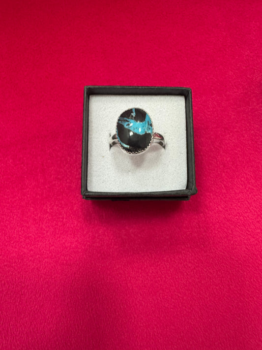 Turquoise ring shown in ring box
