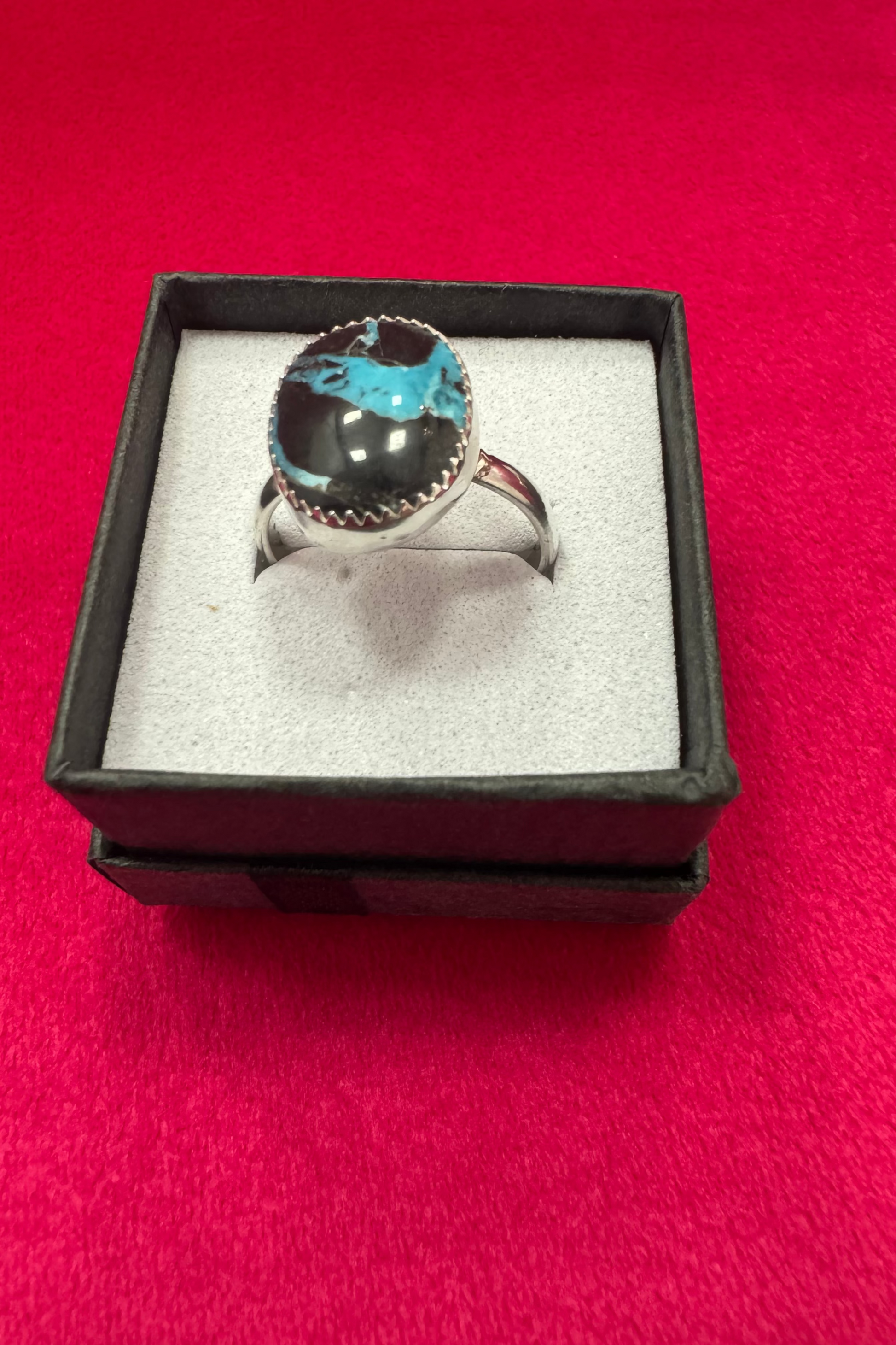 Turquoise ring shown in ring box