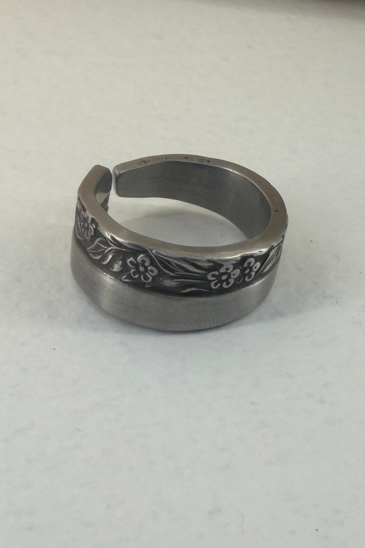 Floral ring shown on white backdrop