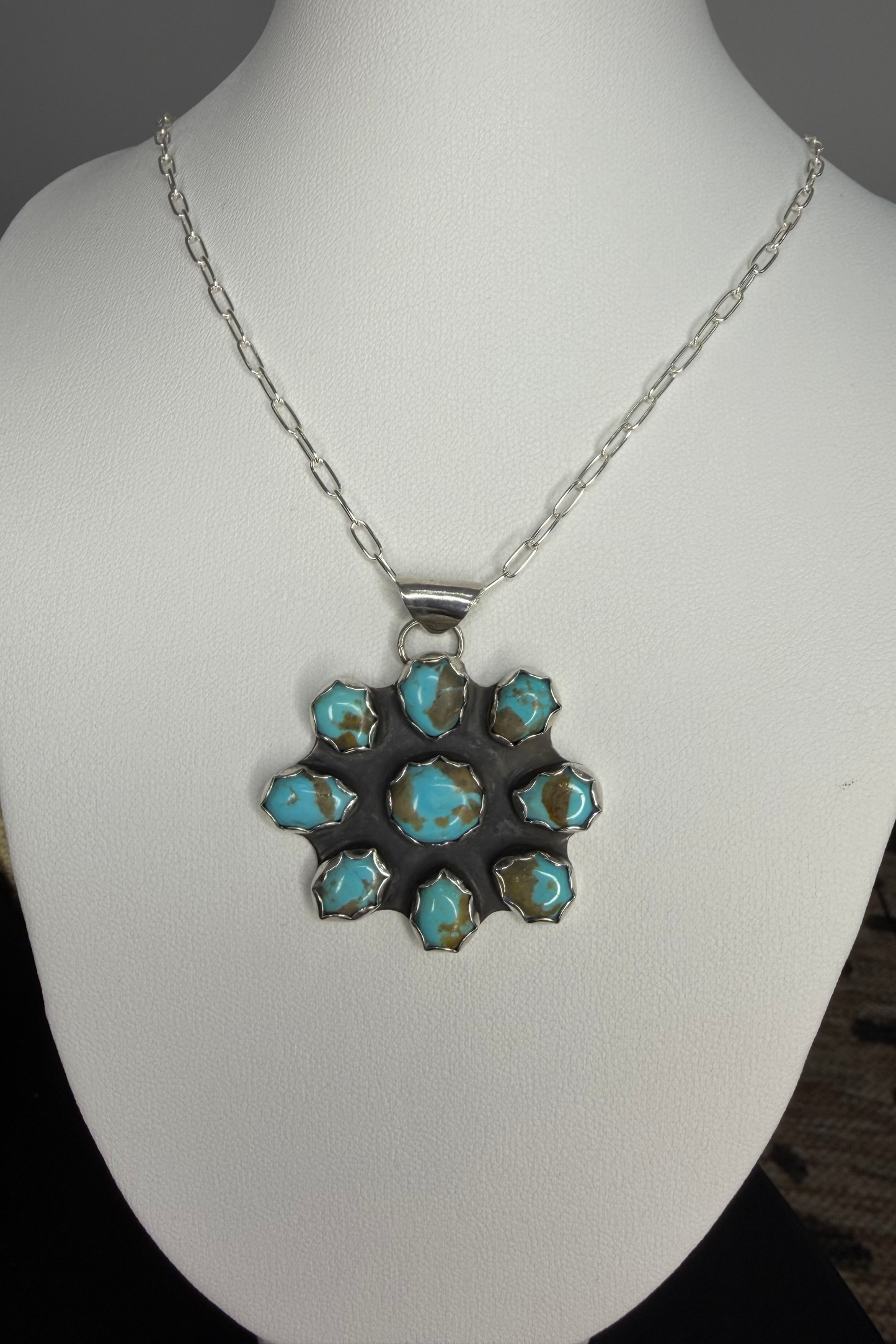 pendant shown on necklace