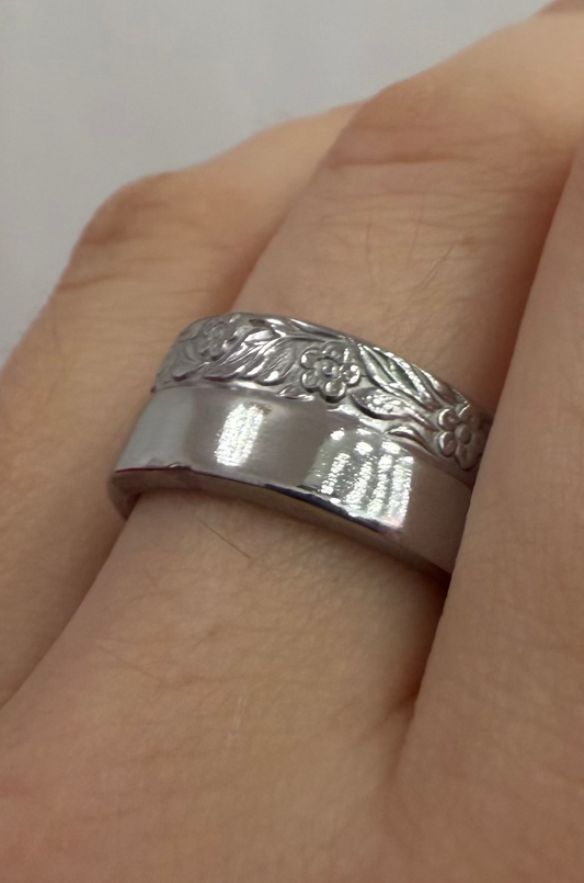 floral ring shown on hand at an angle