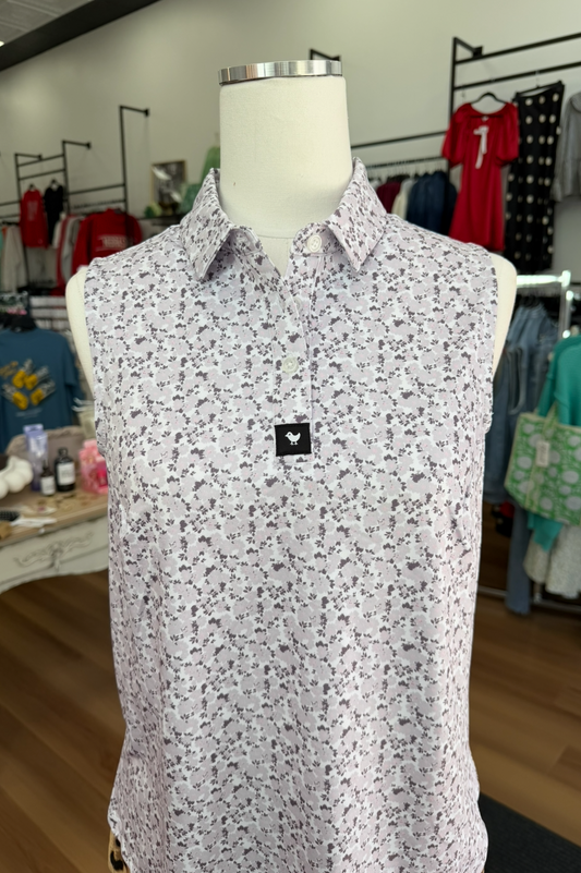 Floral patterned shirt on a mannequin in a clothing store setting