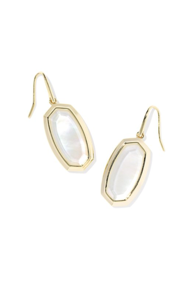 Gold earrings with white stones on a white background