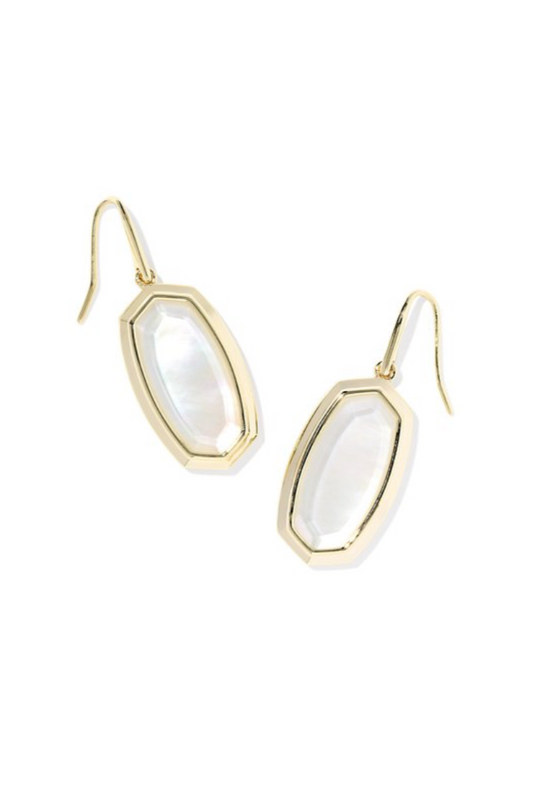 Gold earrings with white stones on a white background