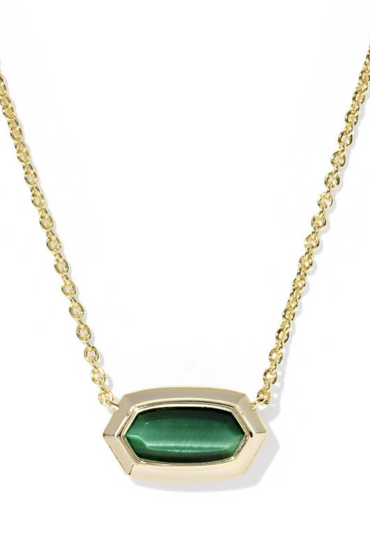 Necklace with a green pendant on a gold chain against a white background