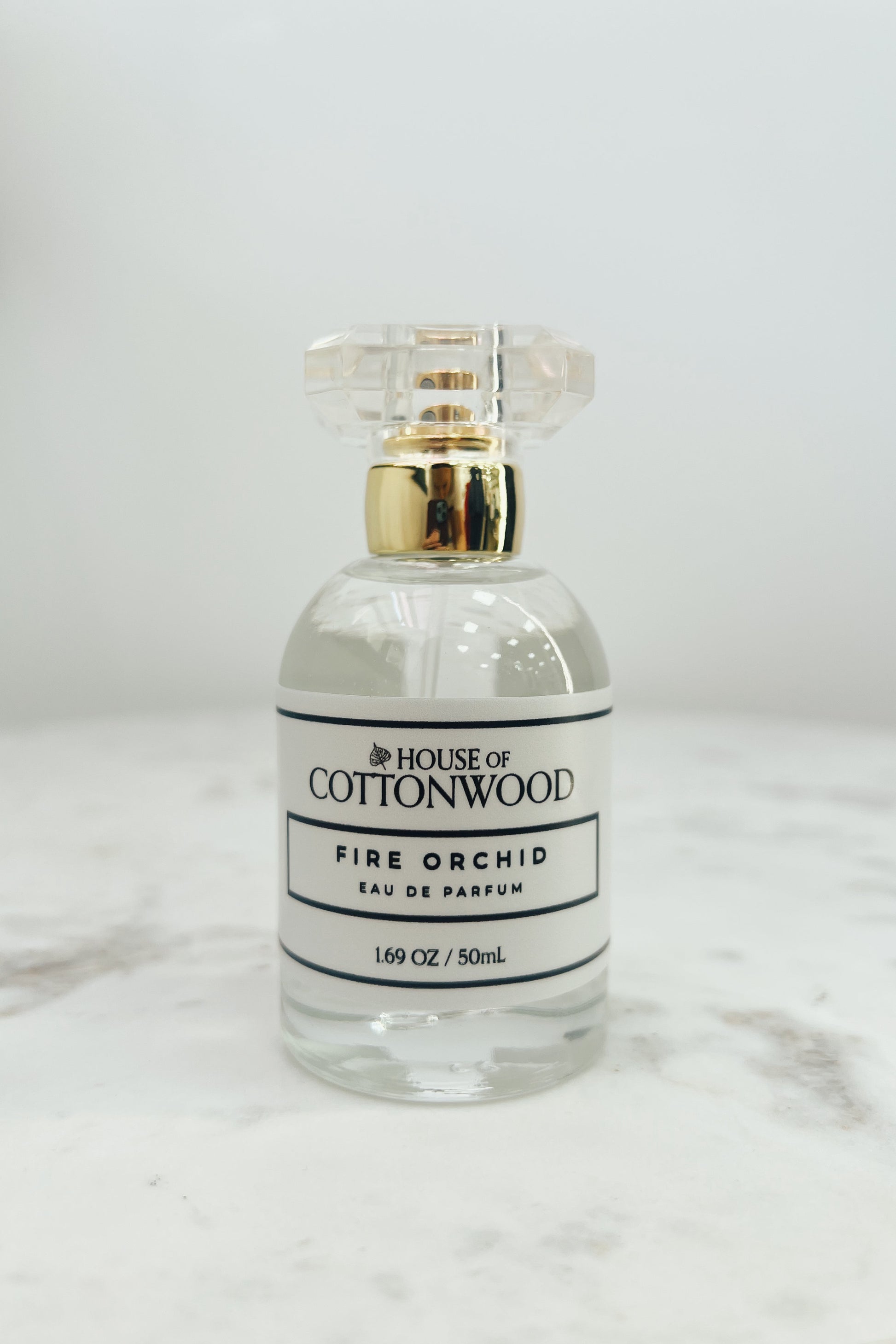 Perfume Bottle on Marble Surface