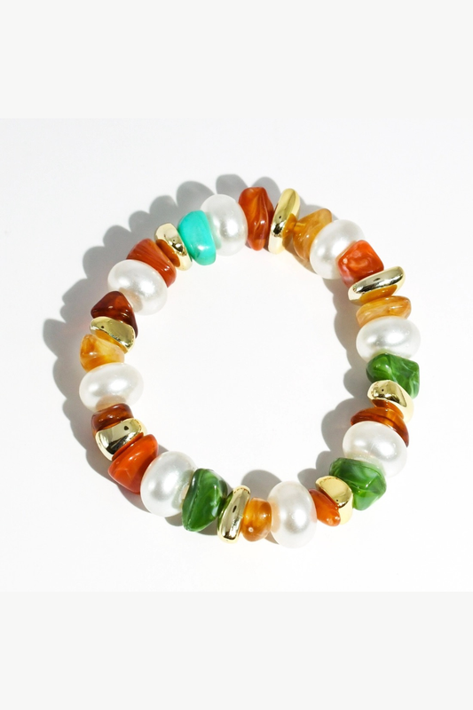 Multicolored beaded bracelet on a white background