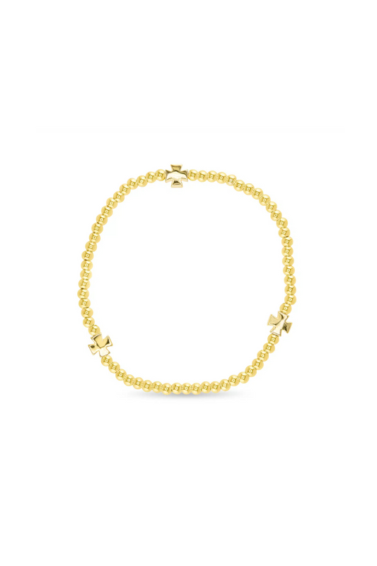 Gold bracelet on a white background