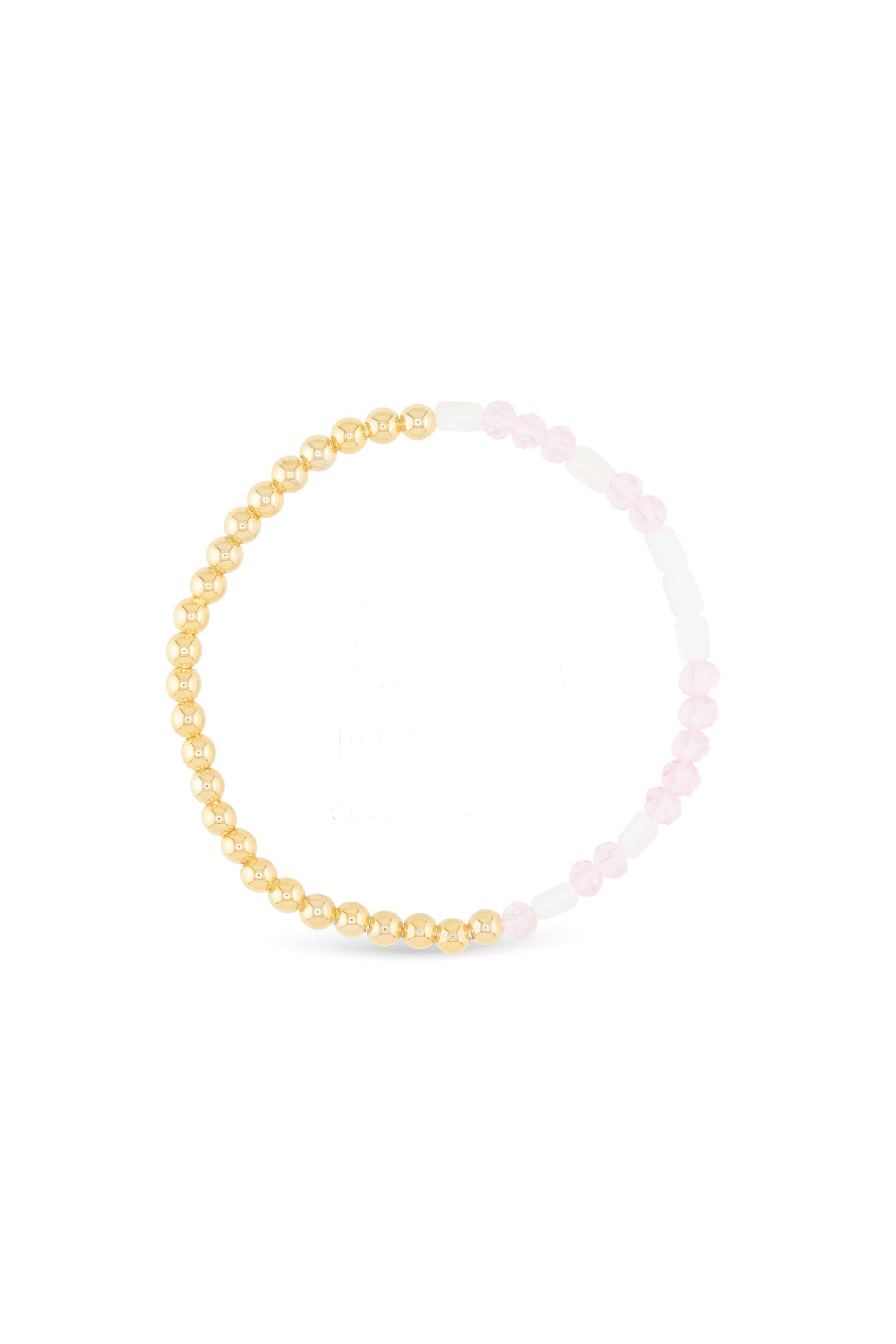 Gold beaded bracelet on a white background