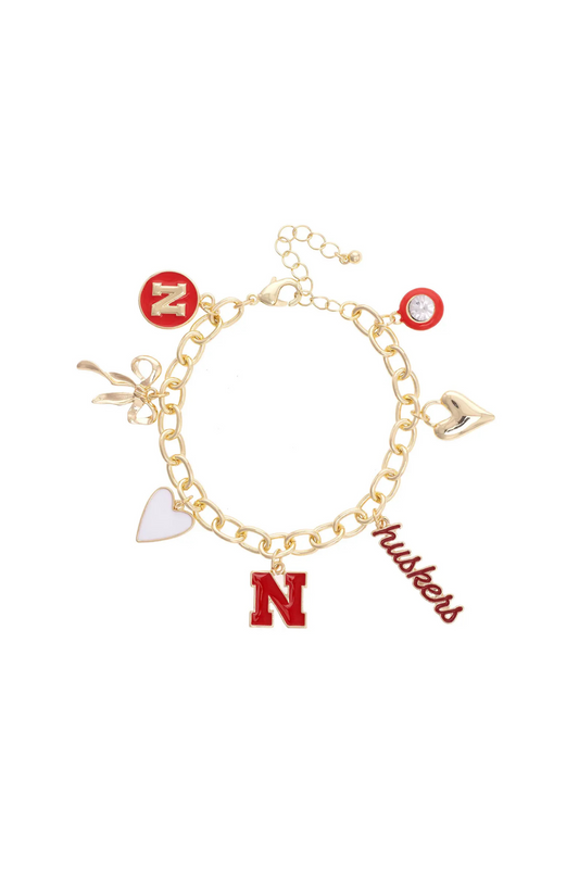 Gold bracelet with gold, white, and read husker charms 