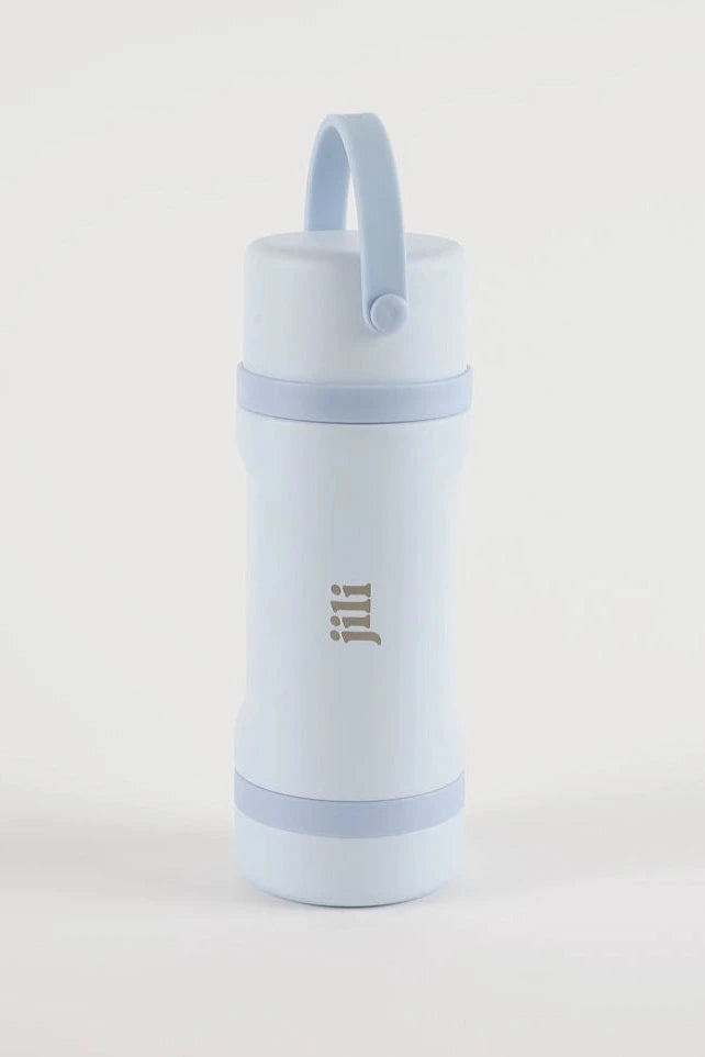 Light blue water bottle with a strap on a light gray background