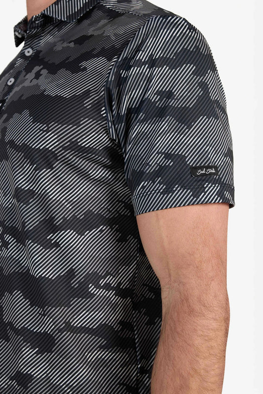 Black and gray camouflage patterned shirt on a white background