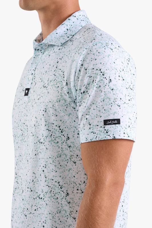 Man wearing a light gray speckled polo shirt with brand logos on a white background