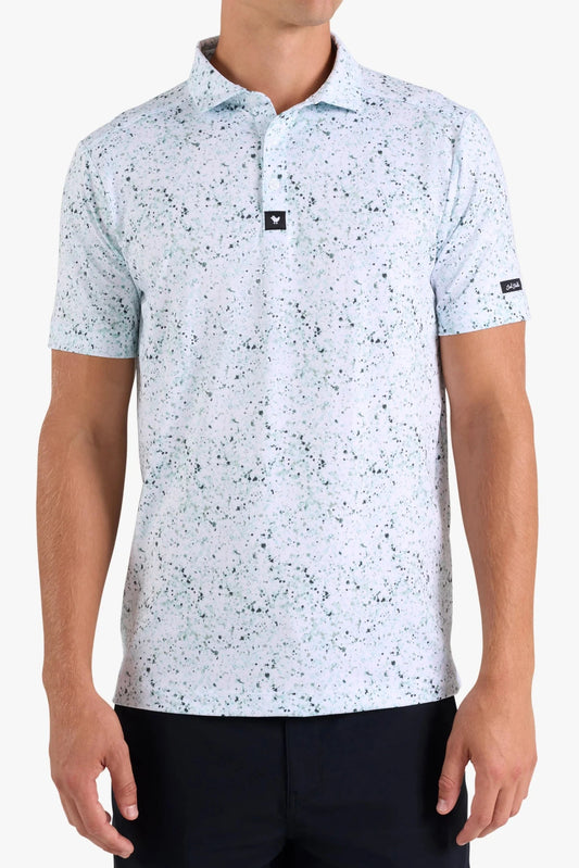 Man wearing a patterned polo shirt on a white background