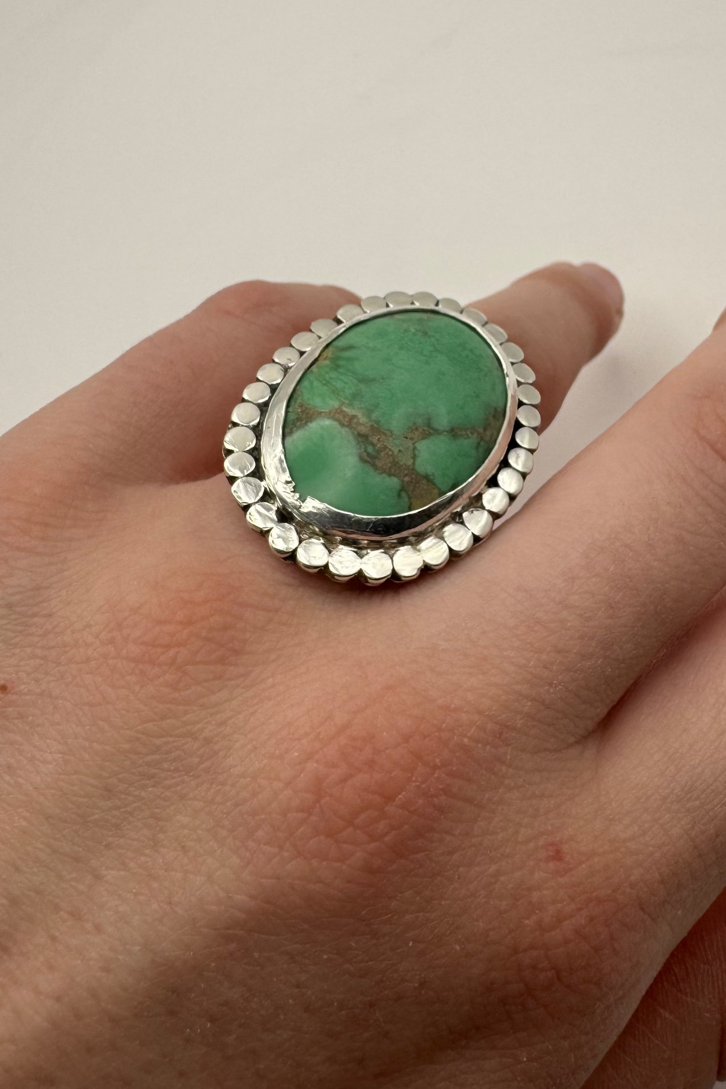 Large turquoise ring shown on finder