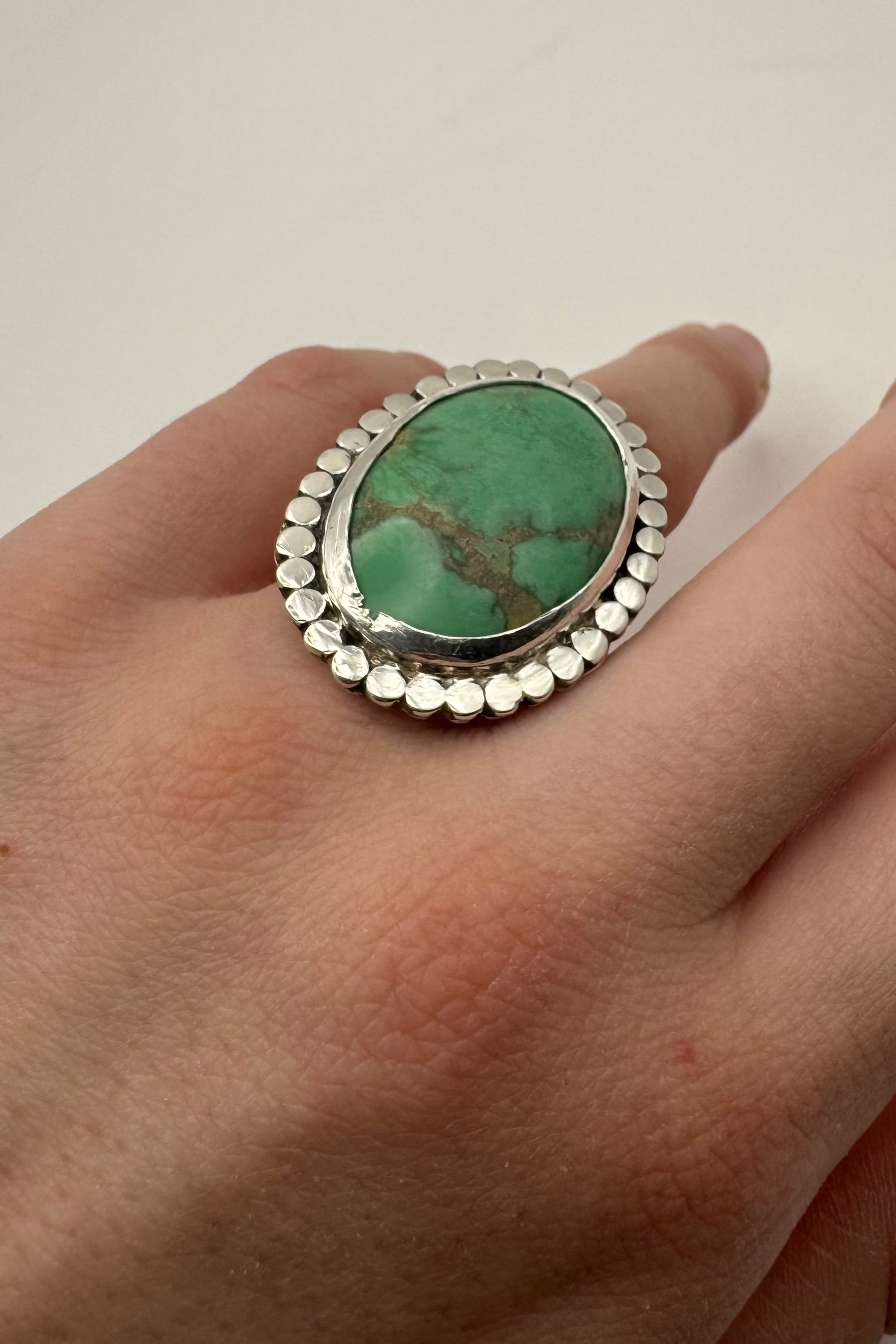 Large turquoise ring shown on finder