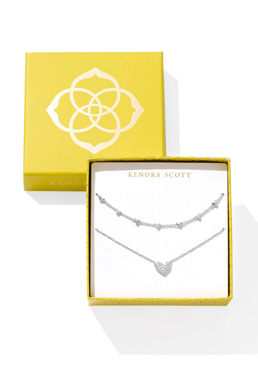 Kendra Scott necklace set in a yellow box on a white background
