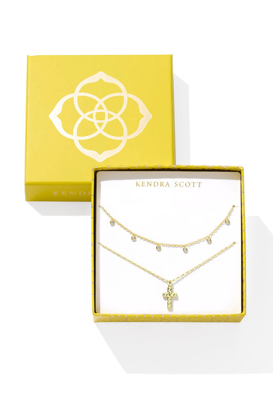 Jewelry set in a Kendra Scott box with a yellow and white design.